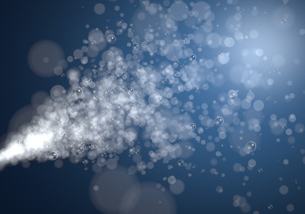 Fine spray mist droplets, backlit